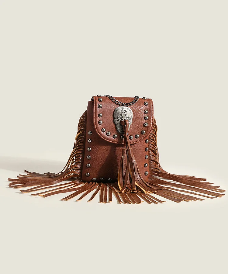 Brown faux leather crossbody bag with studs and tassels, fashionable