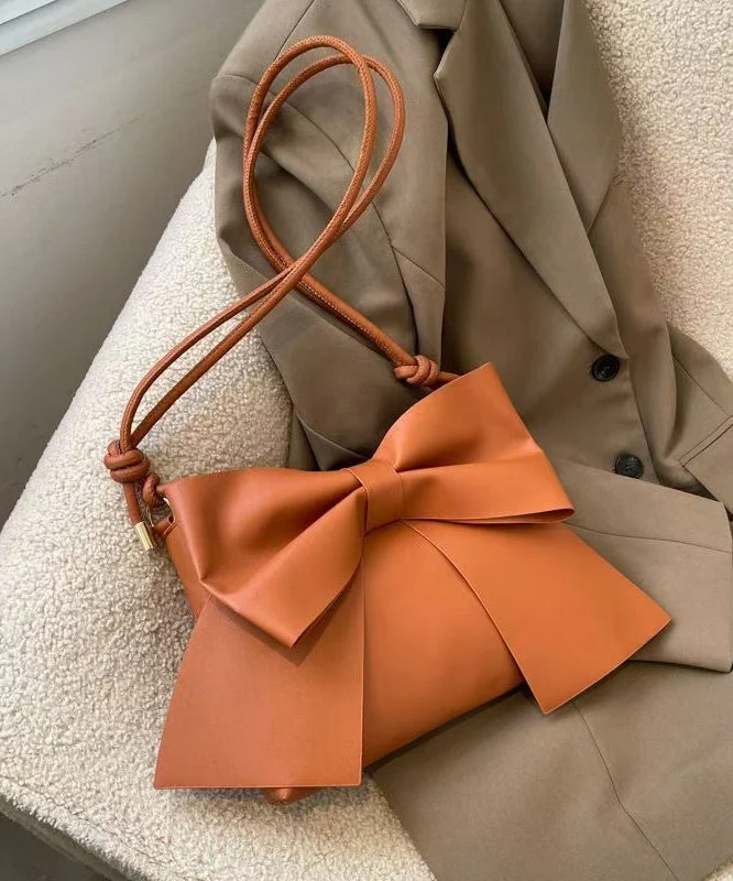 Brown faux leather crossbody bag with original design