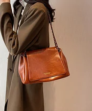 Classic brown faux leather tote bag with chain hook.